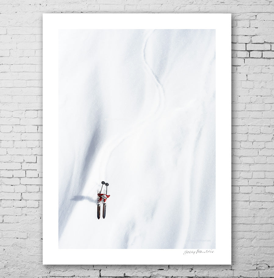 Red Toy SKier on a big mountain by Hooey Mountain