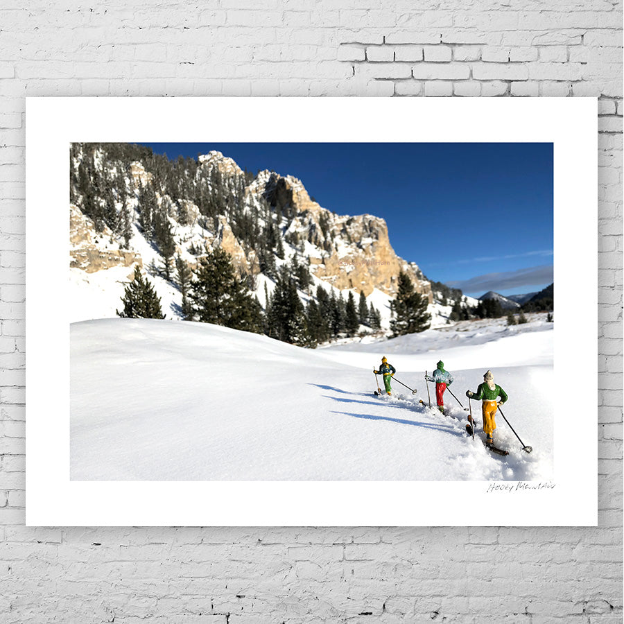 3 vintage toy skiers in the backcountry. Photography by Hooey Mountain