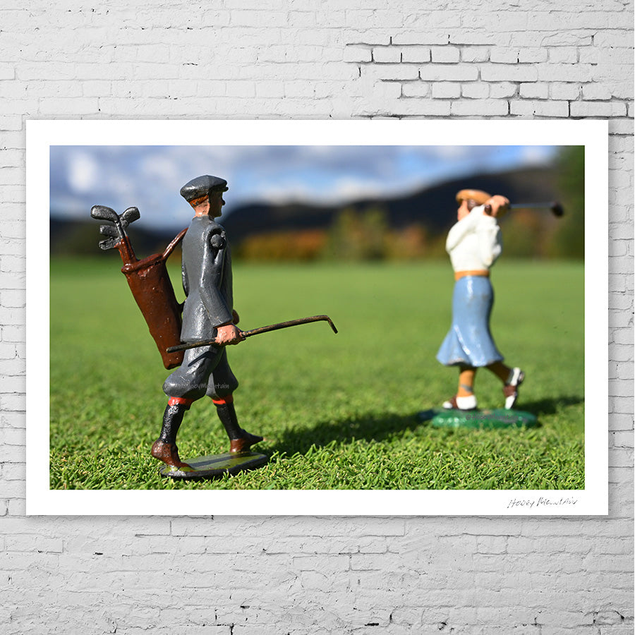 Antique toy golfer playing playing the mountain course.  Fine art print by Hooey Wilks