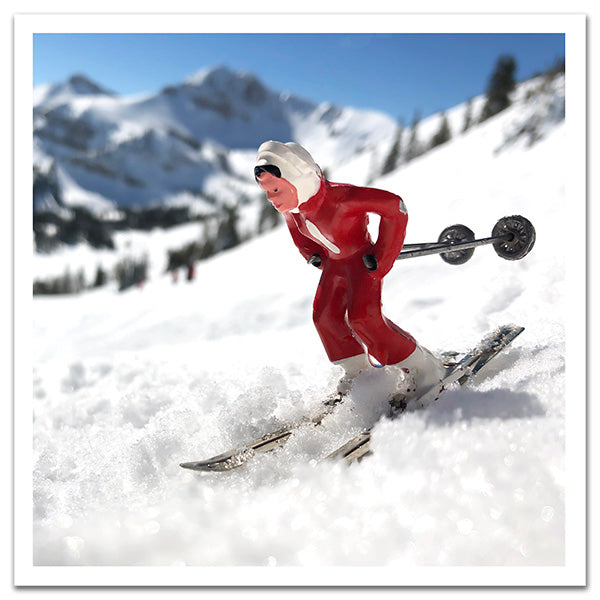 Red toy skier by Hooey Mountain