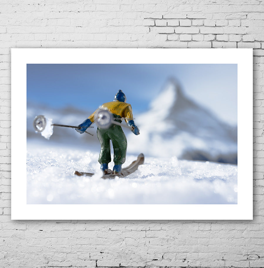Toy skier iun front of Matterhorn in Zermatt Switzerland