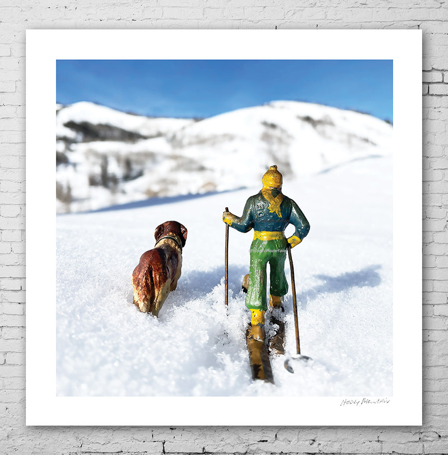 antique toy skier and dog  by Hooey Mountain