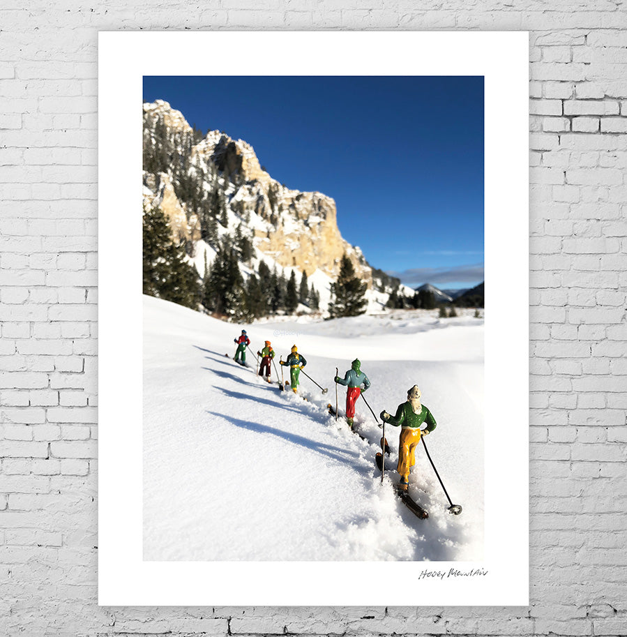 5 antique toy skiers in the backcountry photography by Hooey Mountain