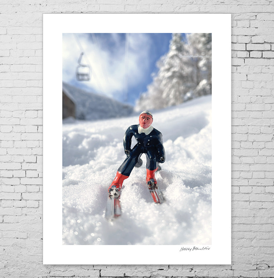 Little Blue toy skier under lift by Hooey Mountain