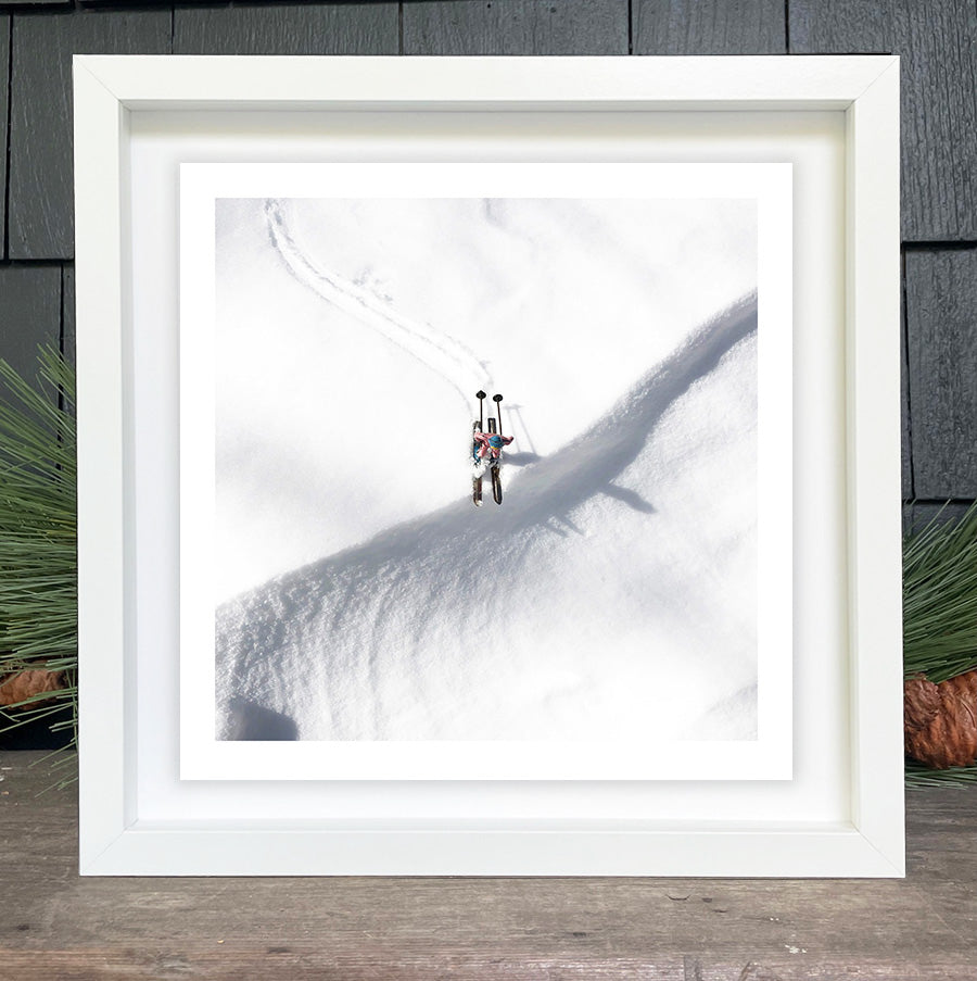 Lone Pink SKiers ready to jump by Hooey Mountain