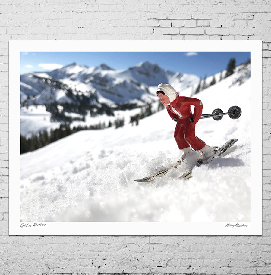 Vintage toy skier on a mountain by Hooey Mountain