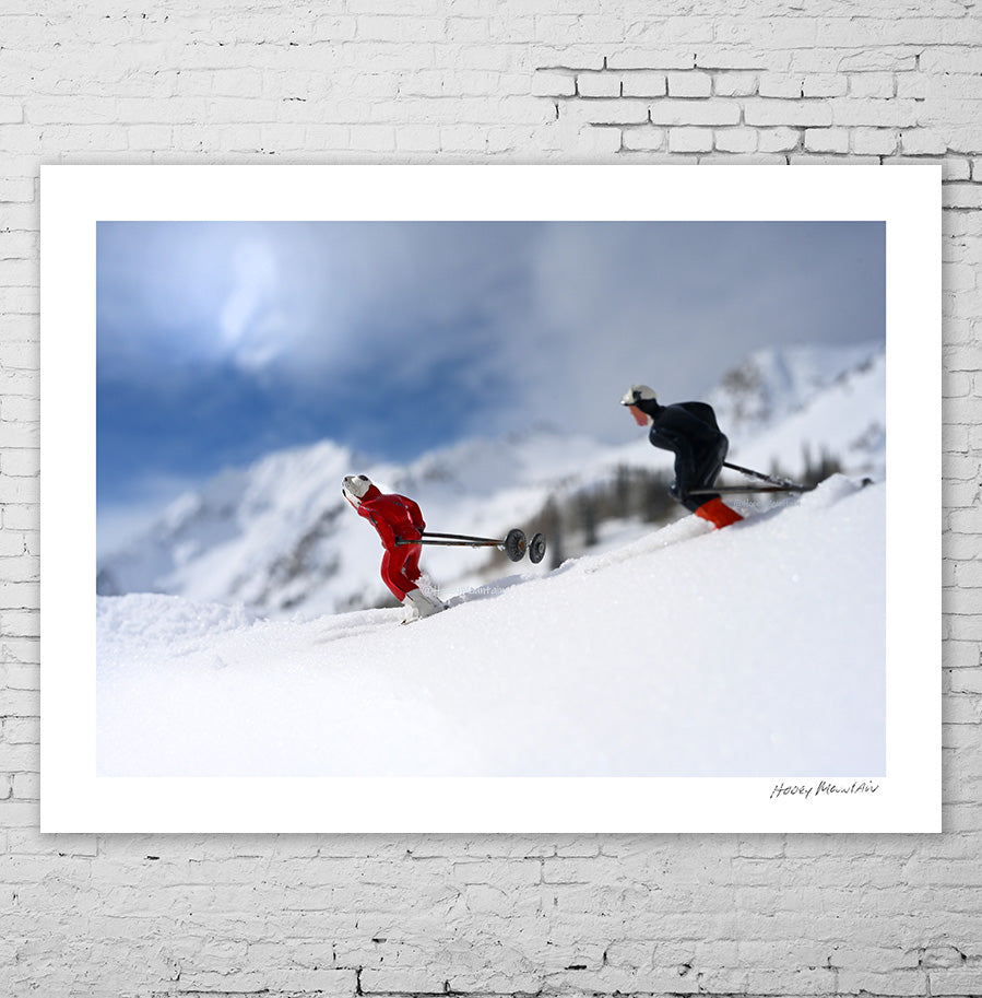 Two Antique toy skiers by Hooey Mountain