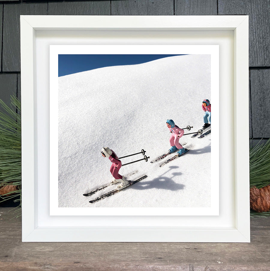 Pink Toy Skiers on a blue bird day by Hooey Mountain