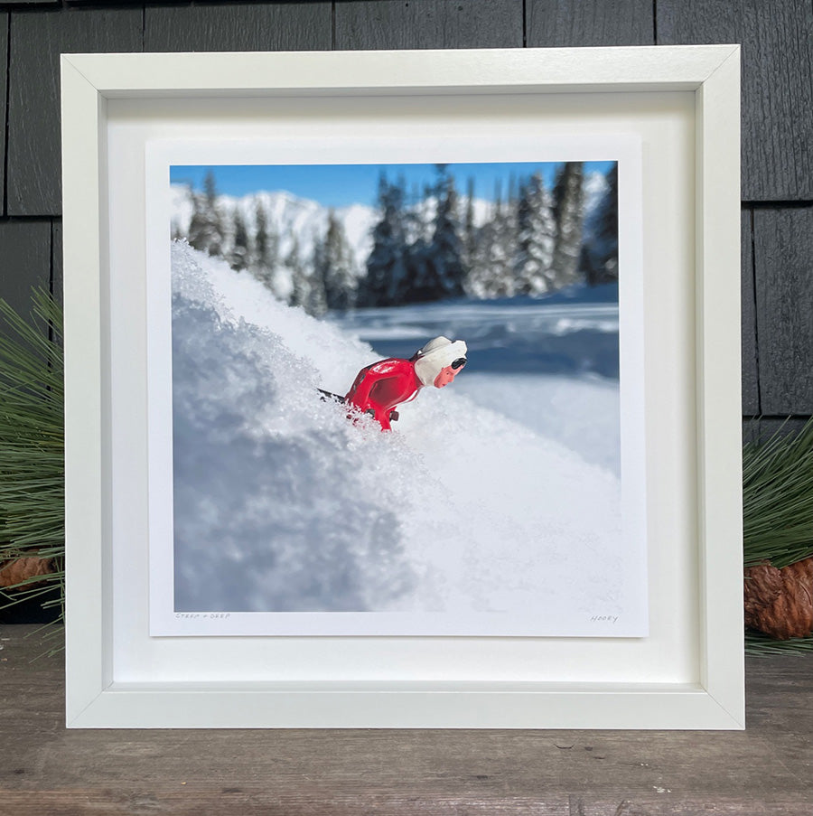 Floated image of Hooey Mountain toy skier in white frame