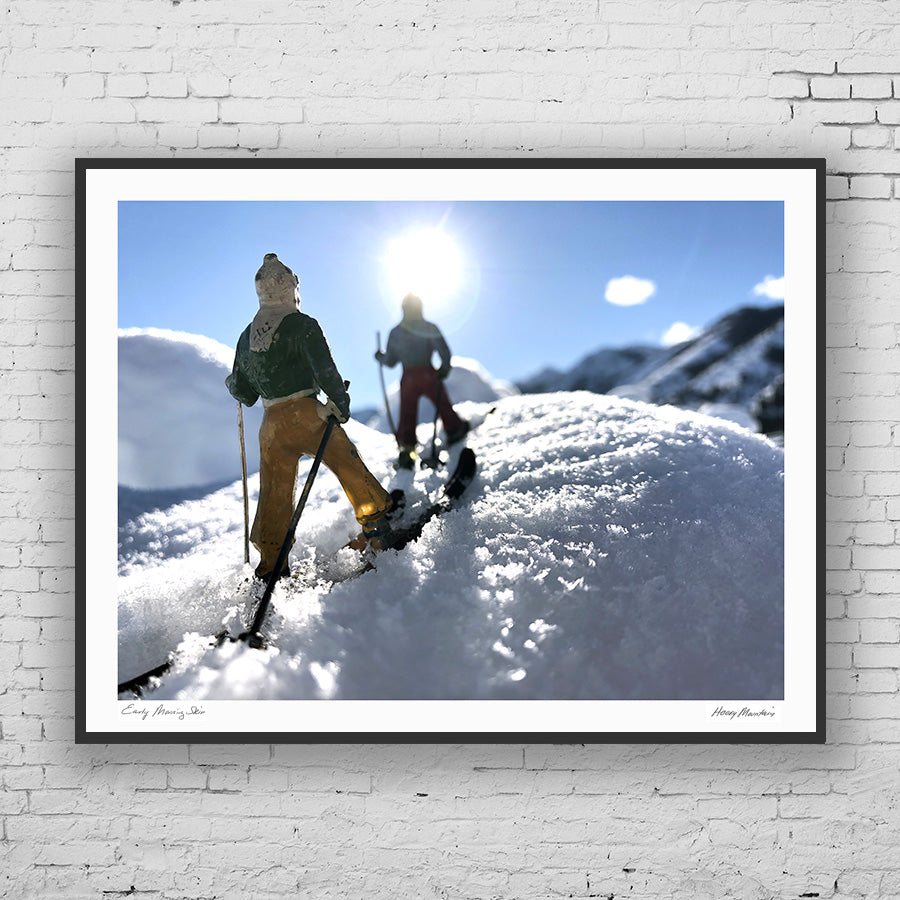 Framed photo of  vintage toy backcountry skiers in snow by Hooey Mountain