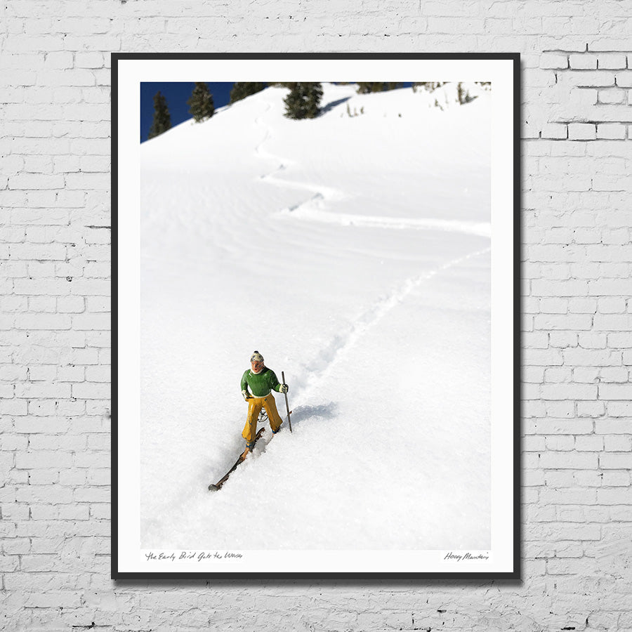 Framed photo of vintage toy skier on snowy mountains by Hooey Mountain